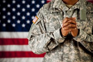 13b)Soldier-Praying-with-Flag[1][1]
